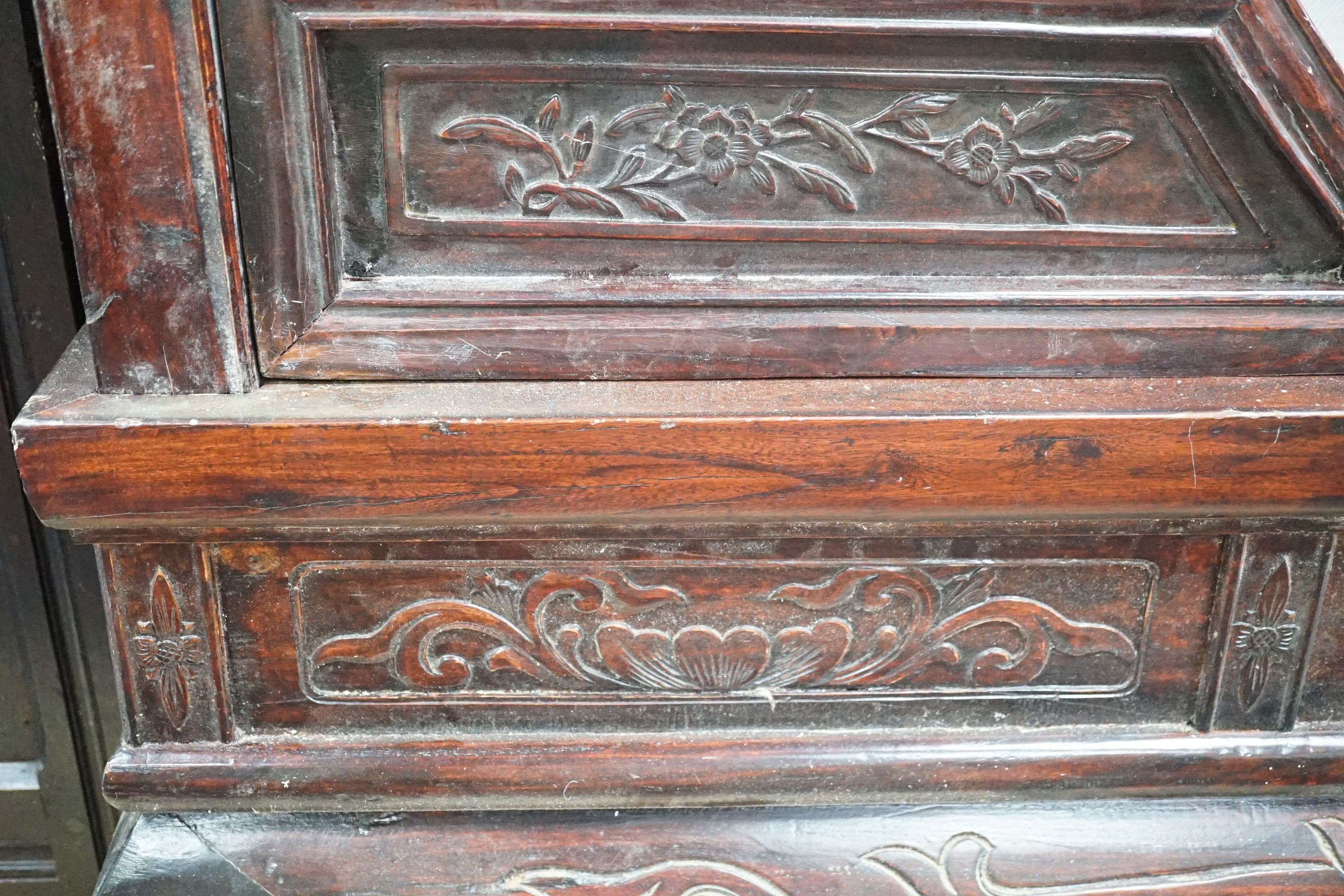 A Chinese carved elm opium bed, width 160cm, depth 207cm, height 225cm